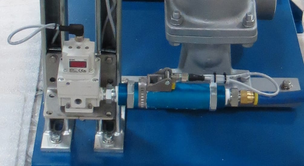 M.W. Watermark Filter Press Controls: AFPCS Pump Pressure Regulator and Pump Air Sensor Mounted to a Feed Pump Skid