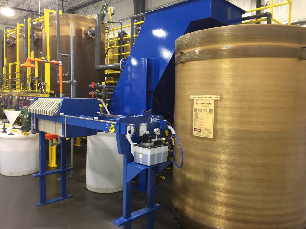 M.W. Watermark™ filter press installed as part of a continuous precipitation metal finishing operation.