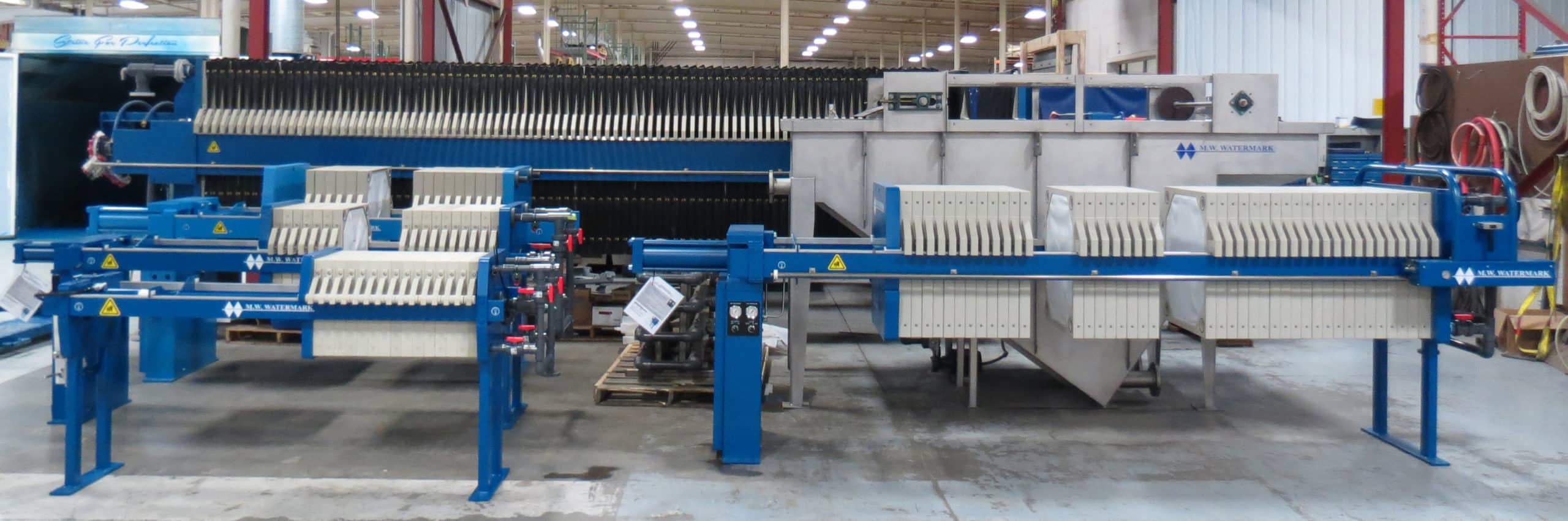 M.W. Watermark - Recycling Laundry Wastewater - filter presses, slant plate clarifiers and DAFs