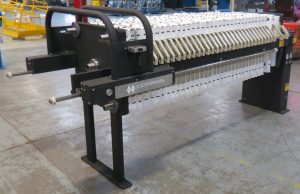 M.W. Watermark 630mm filter press with semi-automatic plate shifter, felt filter cloths and EnduroLiner™ coating - built for cosmetics ingredient manufacturing.