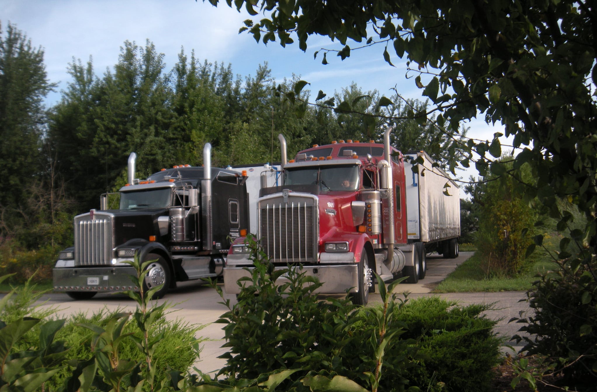A Set of M.W. Watermark Trailer-Mounted Filter Presses - Connected to Tractors and Ready to Haul to the Field for Produced Water Recovery (Fracking)