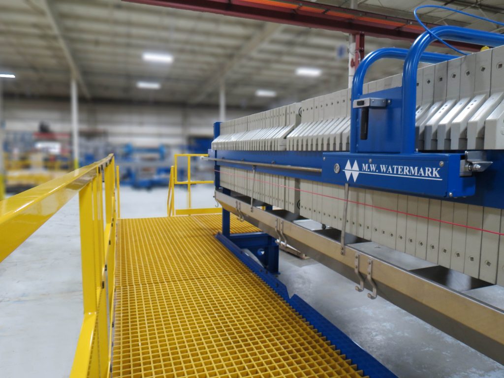 An elevated platform can be a big time saver when operating your filter press. Coupled with a chute and bulk bag hangers, filter cake discharge and removal becomes a snap.