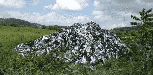 Polyethylene mulch is oftentimes stockpiled on the outskirts of farmland after use. (Photo: biodegradablemulch.org)