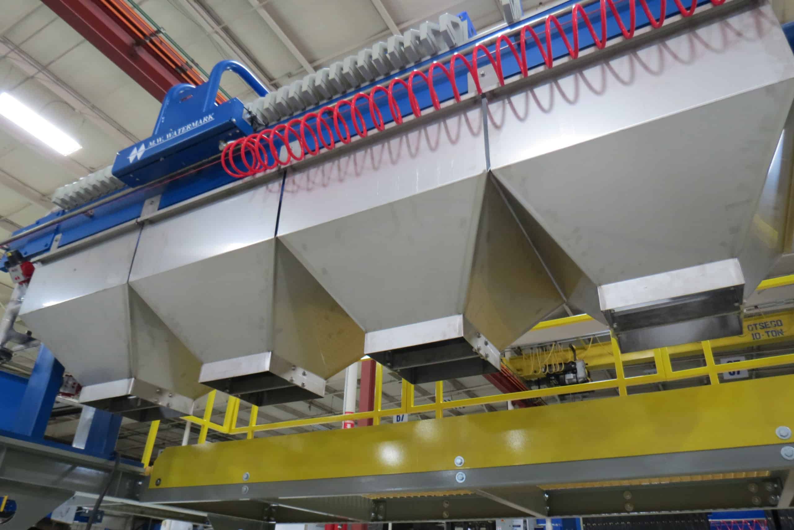 M.W. Watermark Filter Press on Elevated Platform with Custom Stainless Steel Discharge Chute