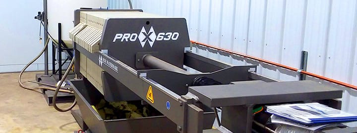 M.W. Watermark Pro-X 630 with Precoat Skid on-site with a filter cake in a dumpster