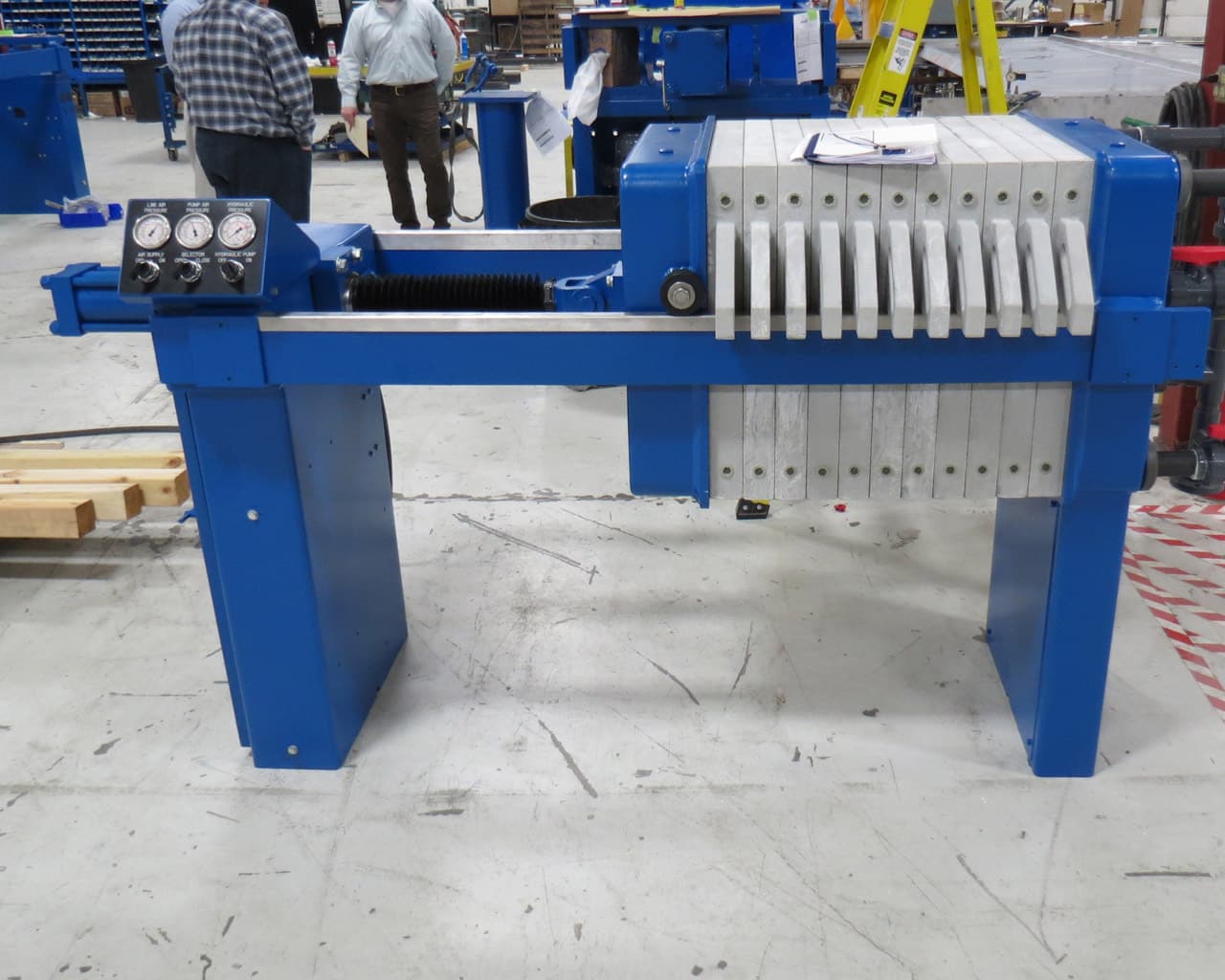 After-shot of left hand side and controls of a blue JWI J-Press following an M.W. Watermark rebuild