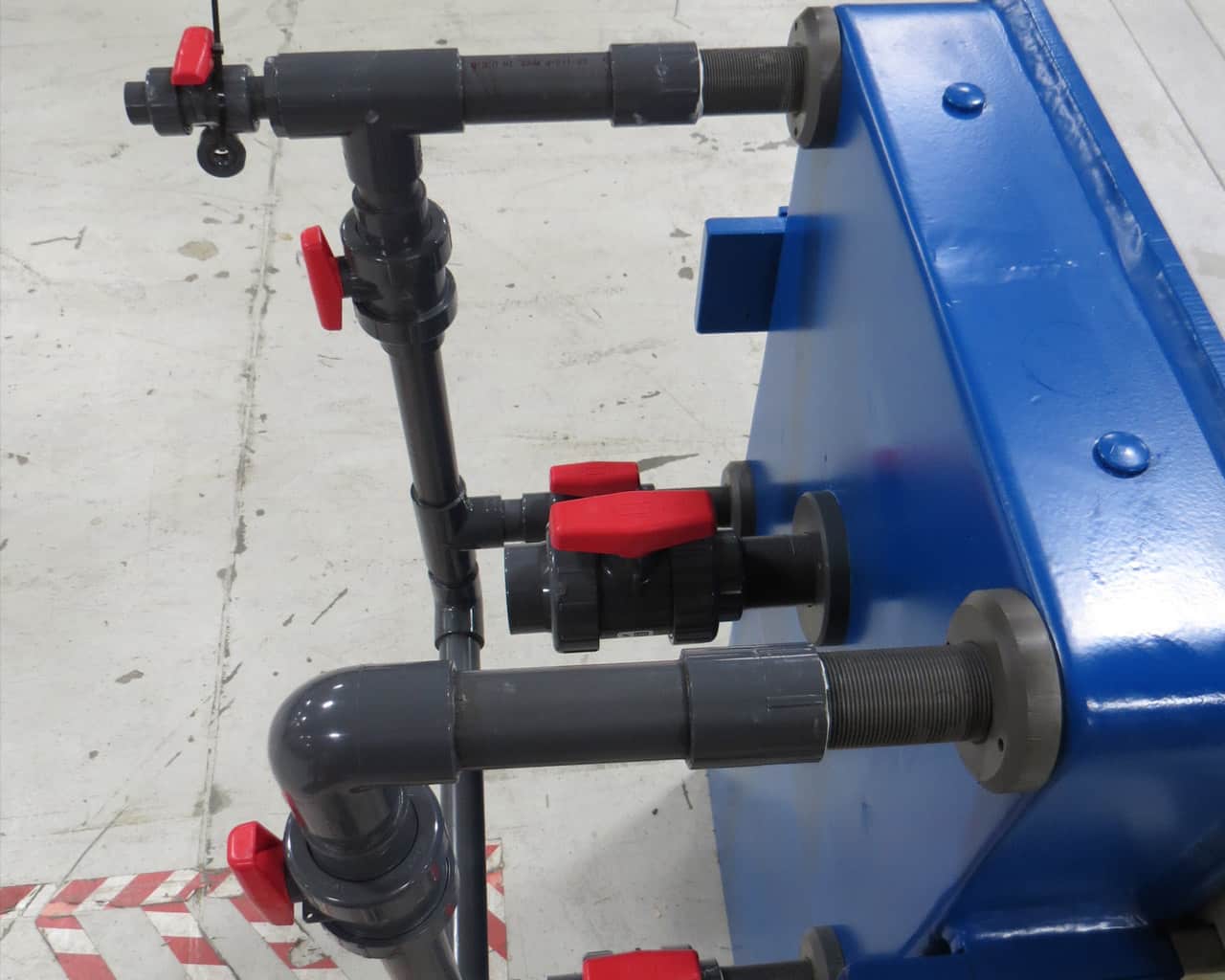 After-shot of a blue JWI J-Press manifold following an M.W. Watermark rebuild