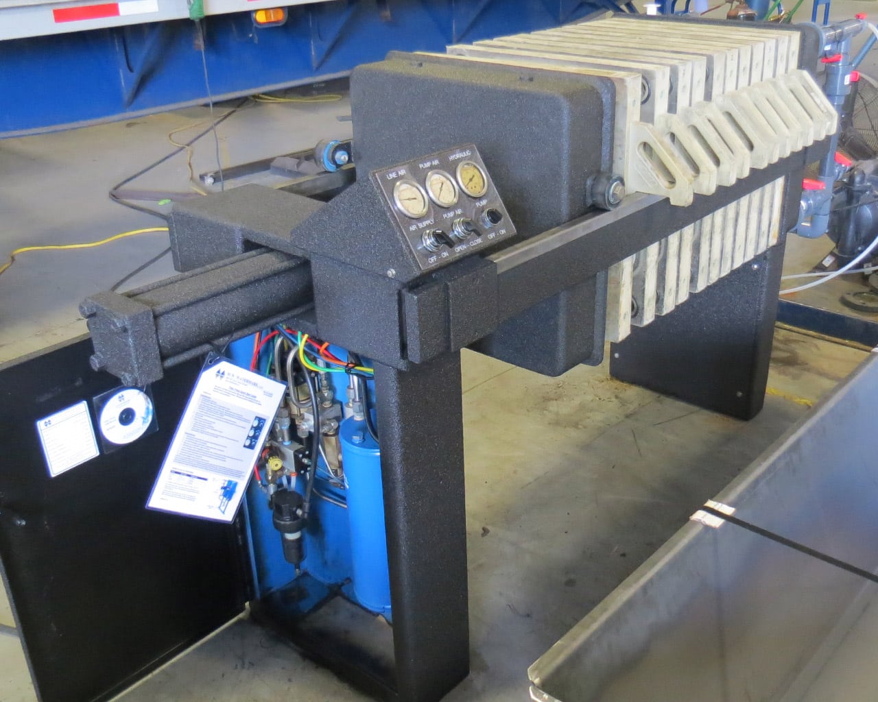 After-shot of left hand side and controls of a black JWI J-Press following an M.W. Watermark rebuild